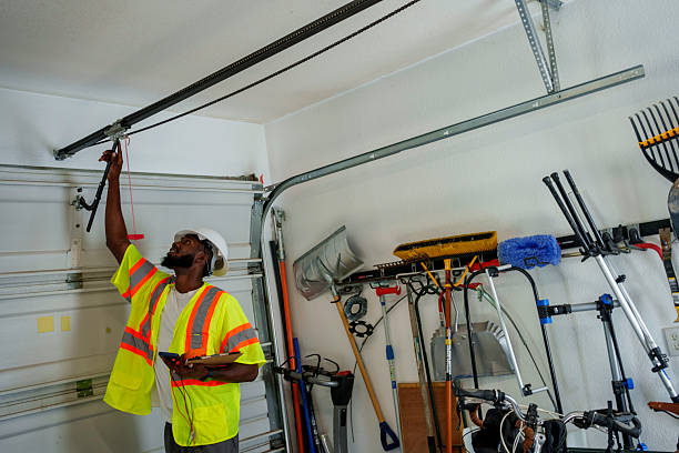 Professional Garage Door Roller Replacement technician working in East Quogue, NY